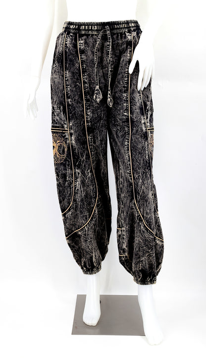 Front view of black handmade Tree of Life embroidered straight-leg harem pants