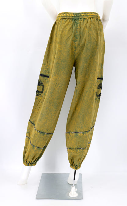 Back view of camo green handmade Tree of Life embroidered straight-leg harem pants