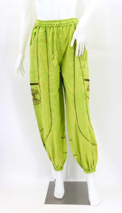 Front view of lime green handmade Tree of Life embroidered straight-leg harem pants