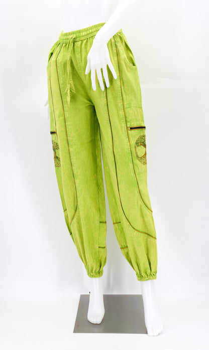 Front view of lime green handmade Tree of Life embroidered straight-leg harem pants