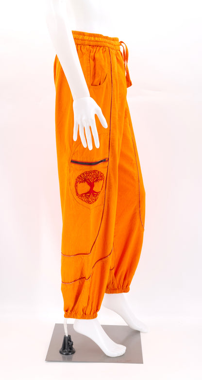 Orange side view highlighting secure zippered and buttoned pockets