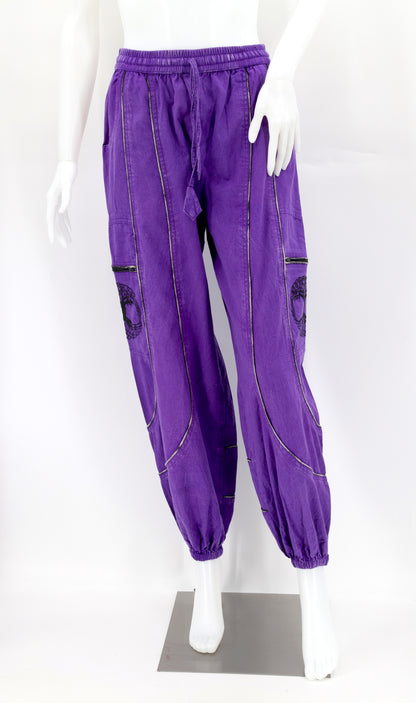 Front view of purple handmade Tree of Life embroidered straight-leg harem pants
