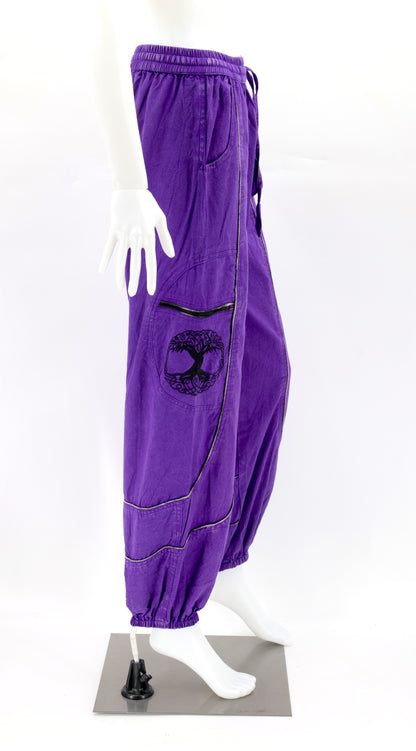 Purple side view highlighting secure zippered and buttoned pockets