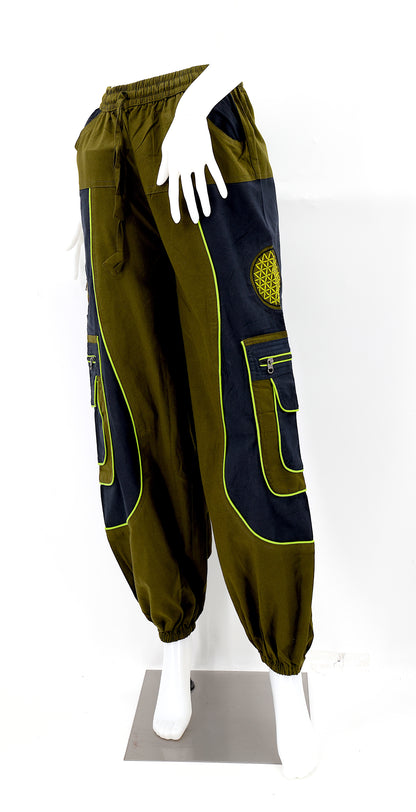 Close-up of camo green embroidered Flower of Life symbol on handmade trousers