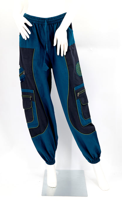 Front view of handmade teal blue cotton harem pants with Flower of Life embroidery