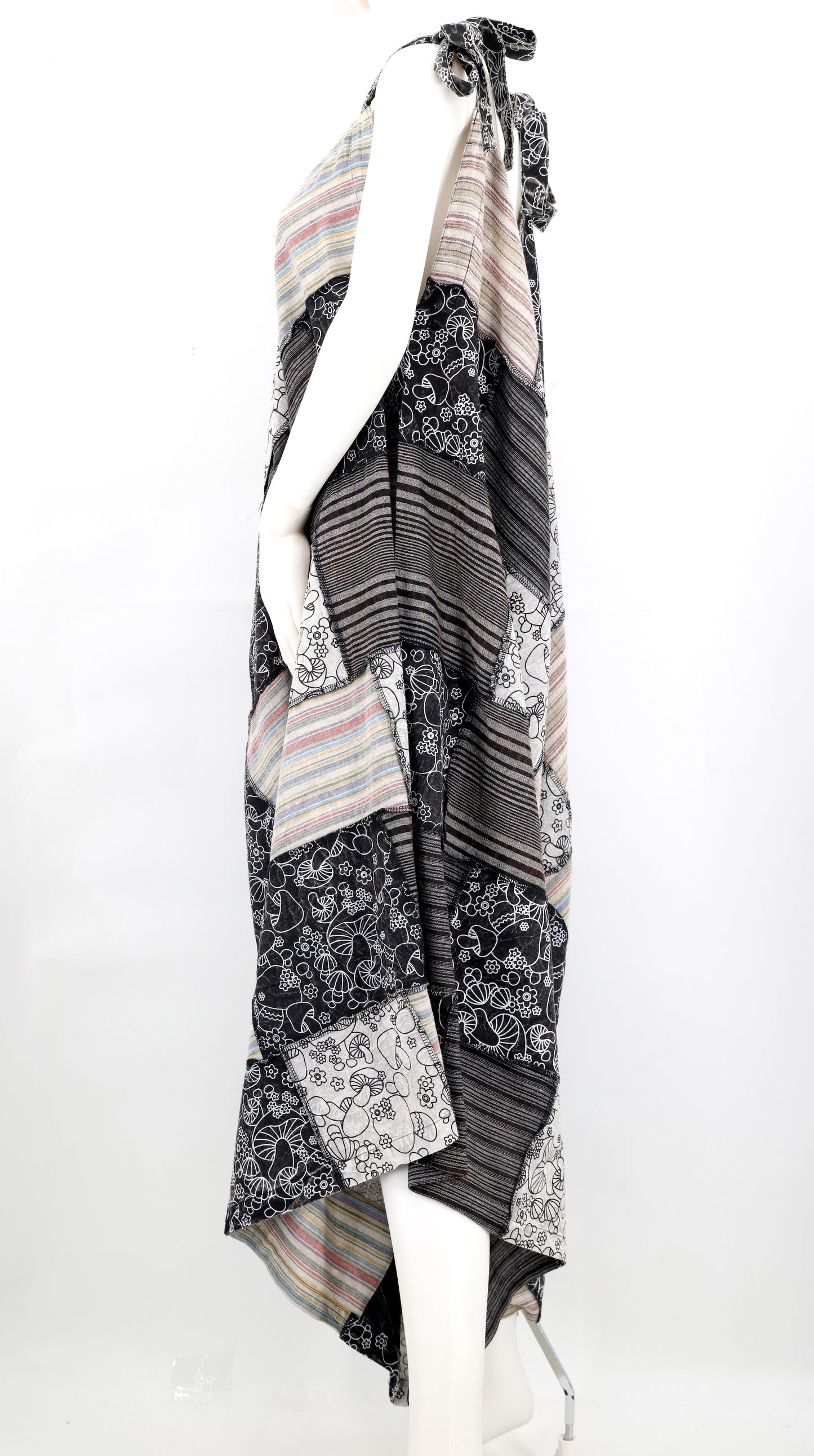 Patterned scarf on a mannequin against a white background