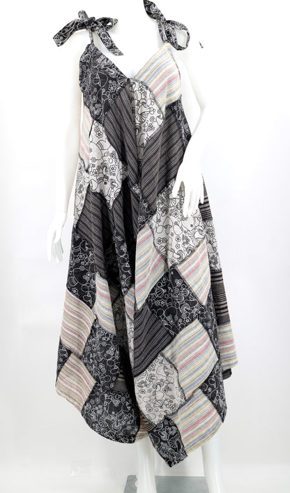 Patchwork dress with floral and striped patterns on a white background