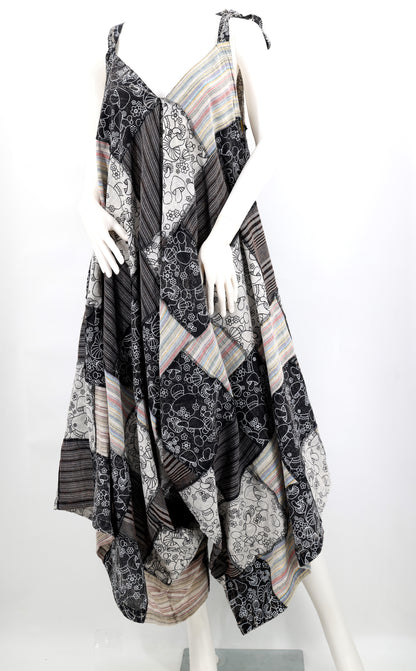 Mannequin wearing a patterned dress with a white background