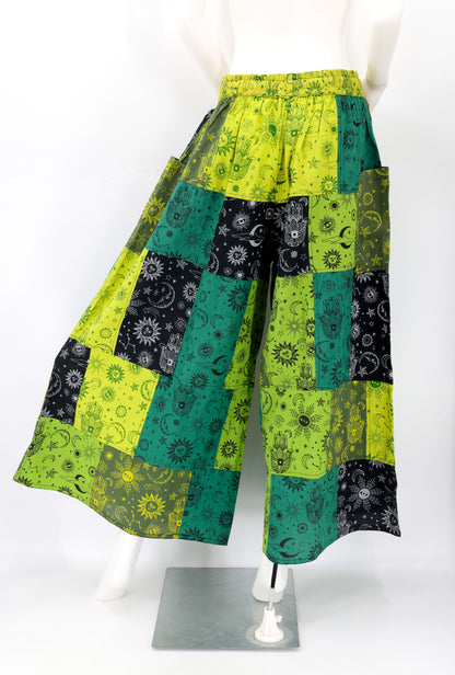 Back view showing unique patchwork pattern and relaxed fit of celestial print harem trousers