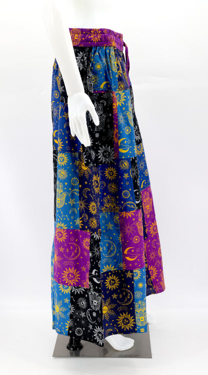 Side view of adjustable waistband and large pockets on cotton boho wide-leg pants