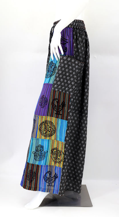 Side view showing adjustable waistband and large pockets on handmade bohemian wide-leg pants