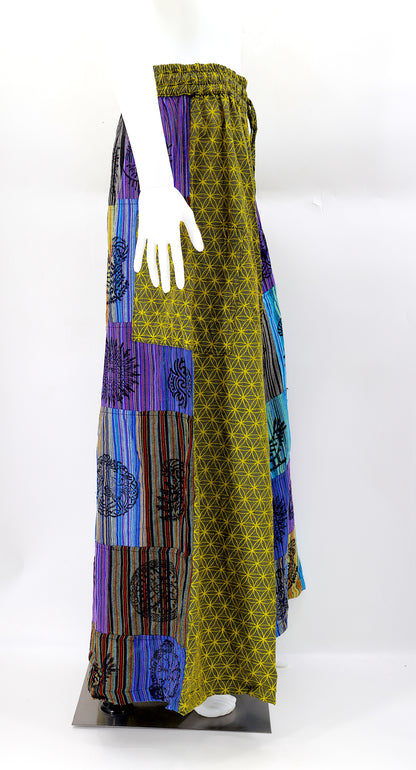 Side view showing adjustable waistband and large pockets on handmade bohemian wide-leg pants