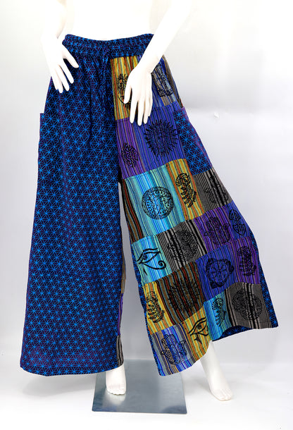 Front view of handmade Flower of Life patchwork wide-leg harem pants with pagan symbol block prints
